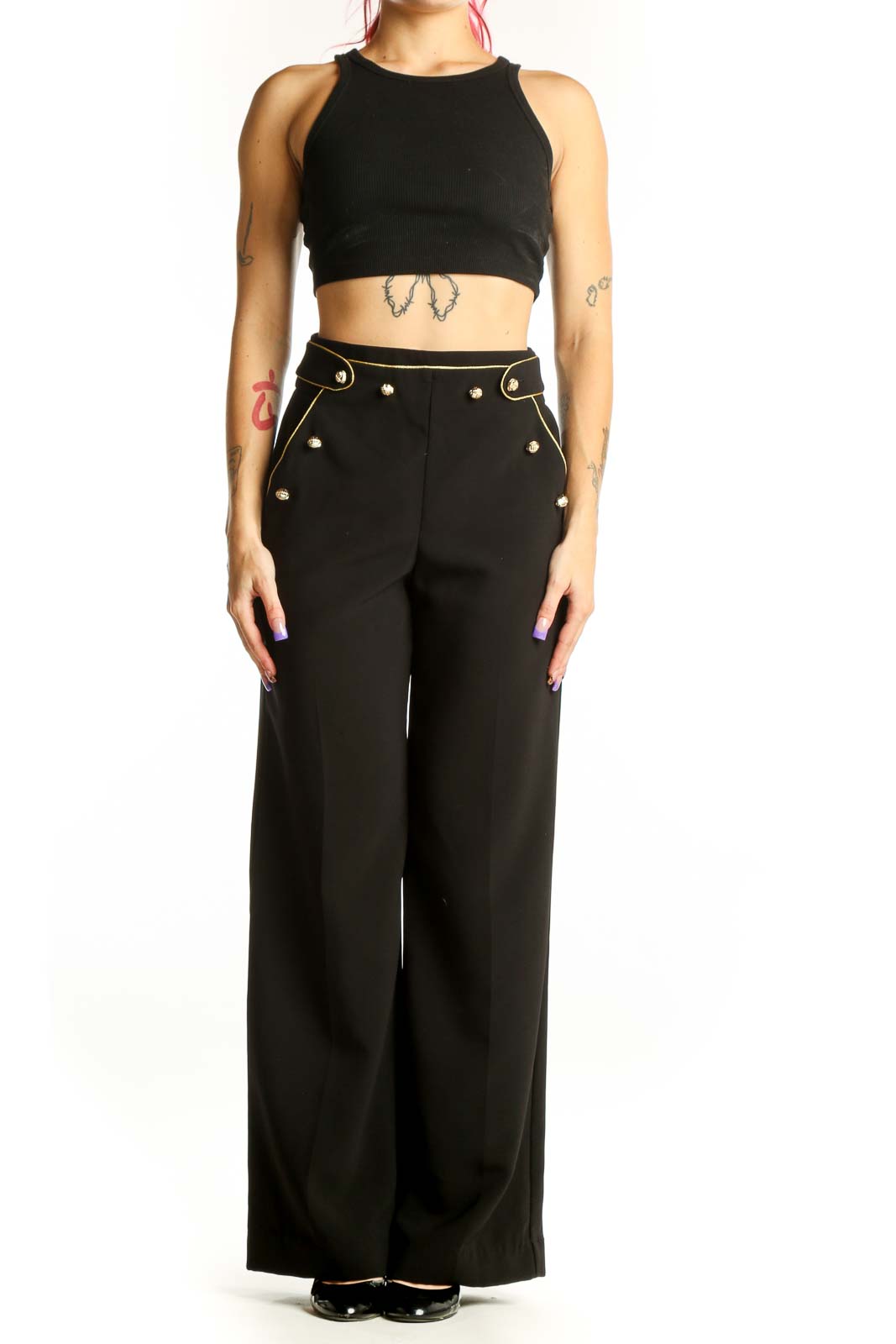 Black wide-leg pants with gold stud details and high-waisted silhouette, front view