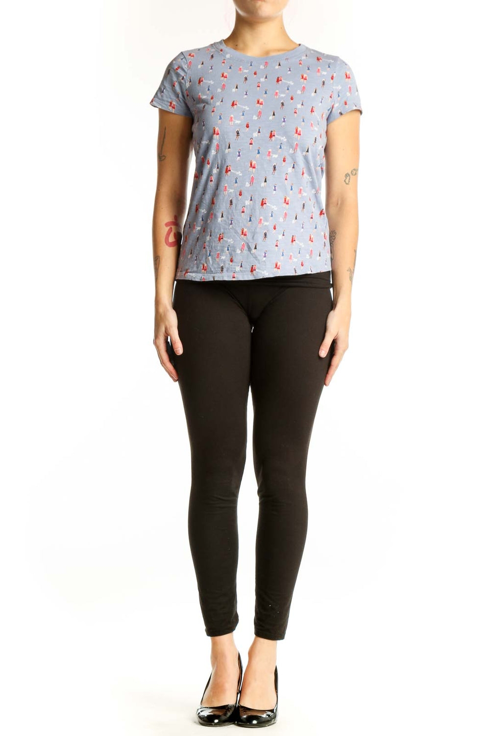 Blue printed cotton short sleeve tee by Boden with red and white whimsical motif, front view on model