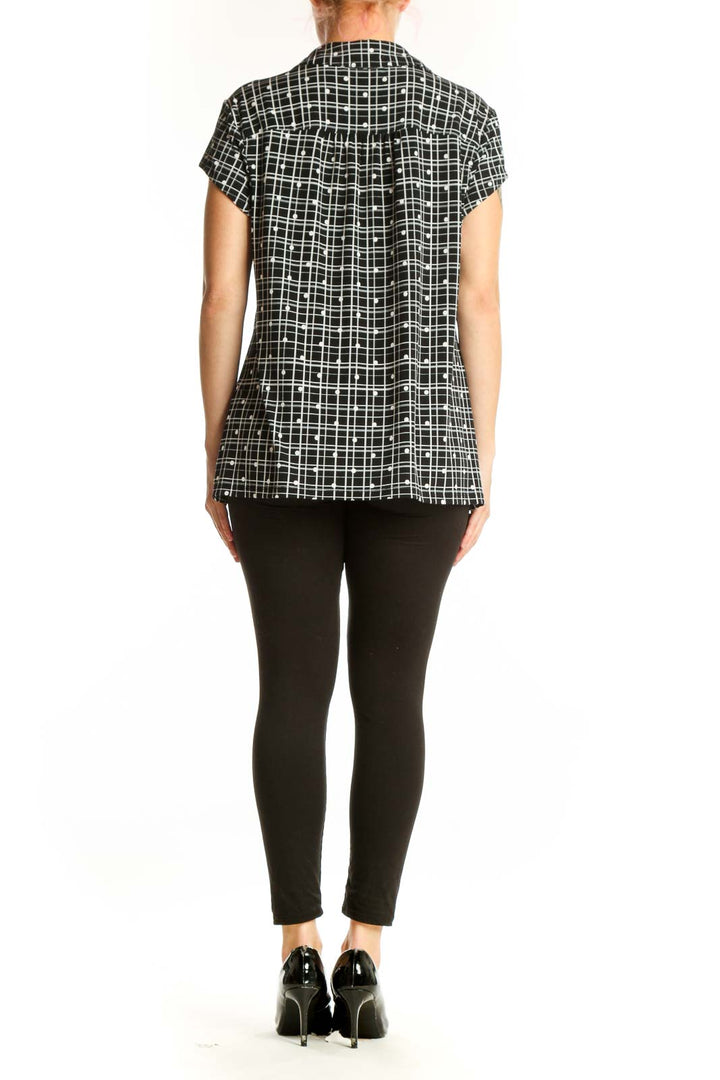 Black and white grid pattern short sleeve button-up shirt, back view showing relaxed fit