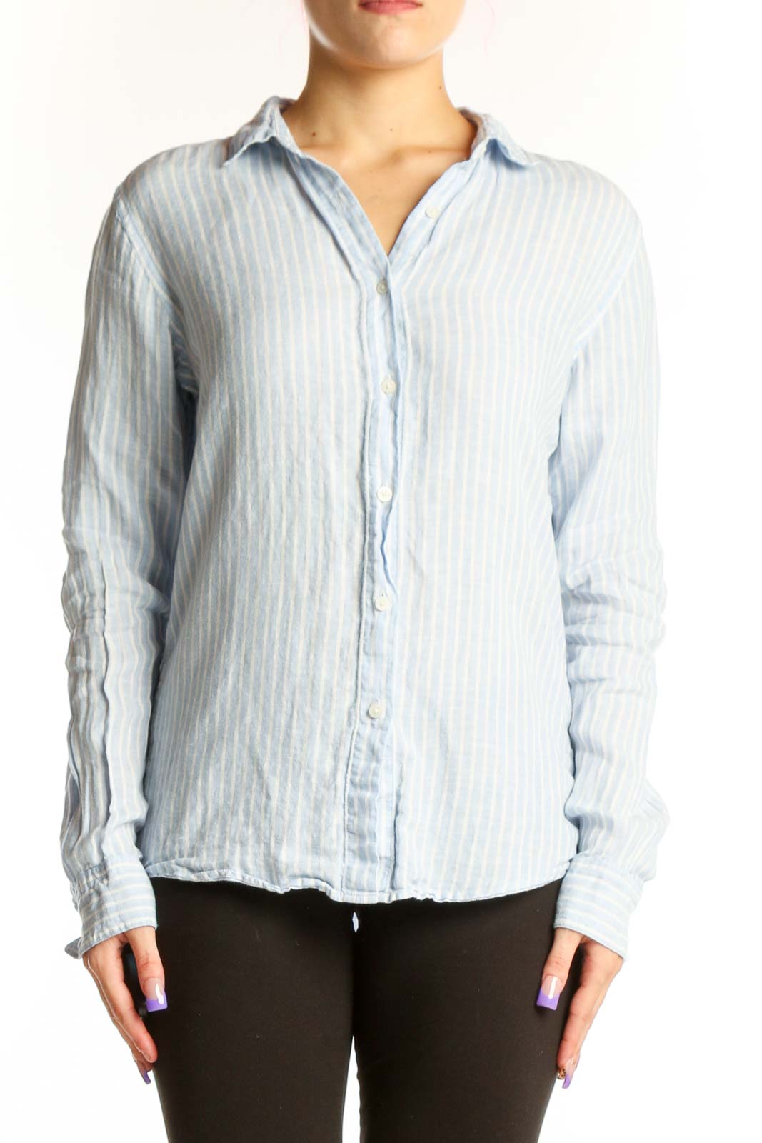 Blue and white striped linen button-up shirt front view on model, size S