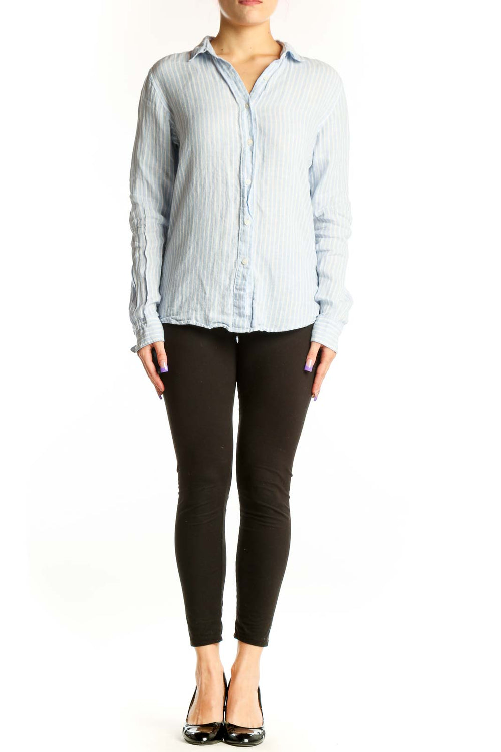 Blue and white striped linen button-up shirt front view on model, size S