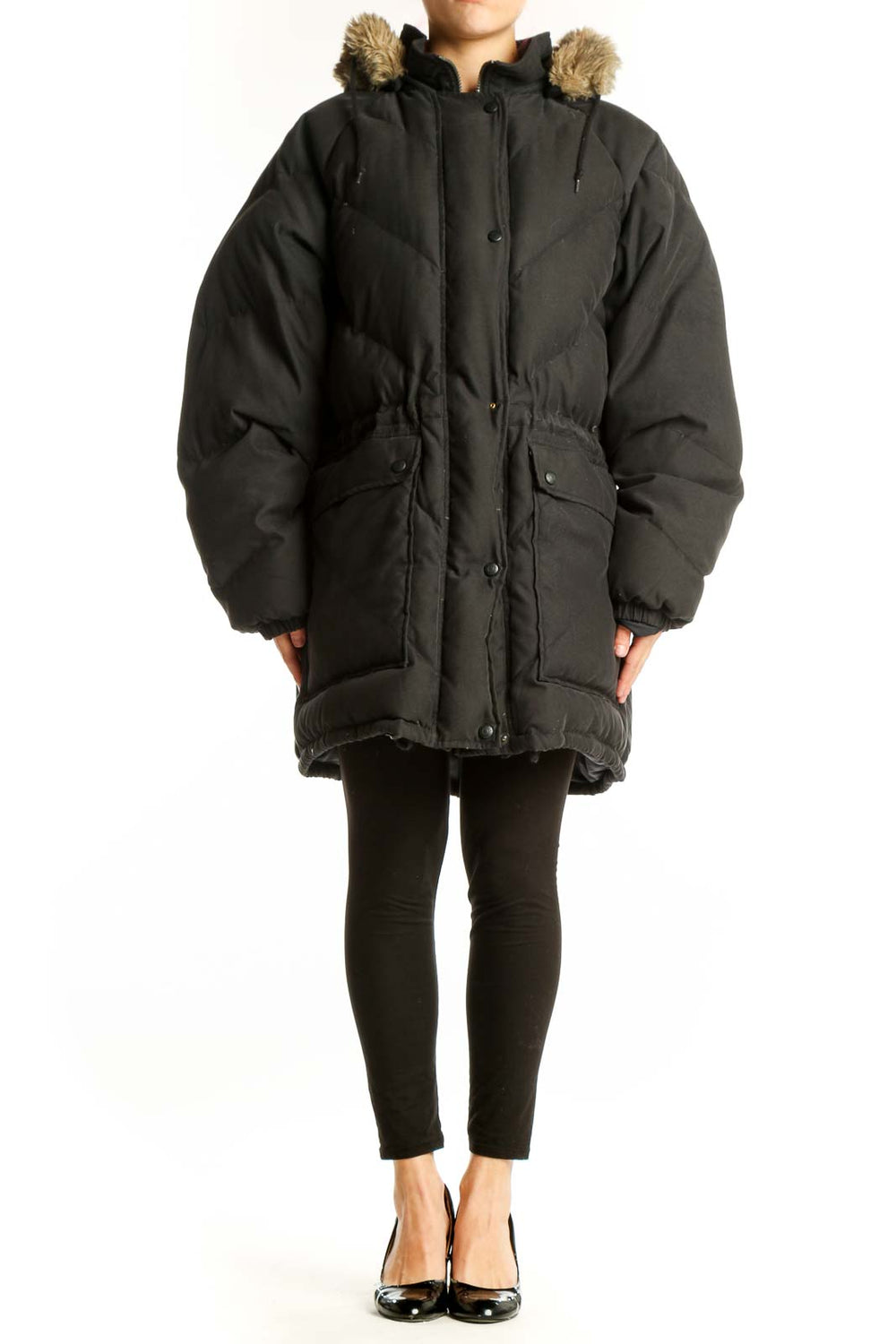 Black quilted puffer coat with faux fur-trimmed hood, front view