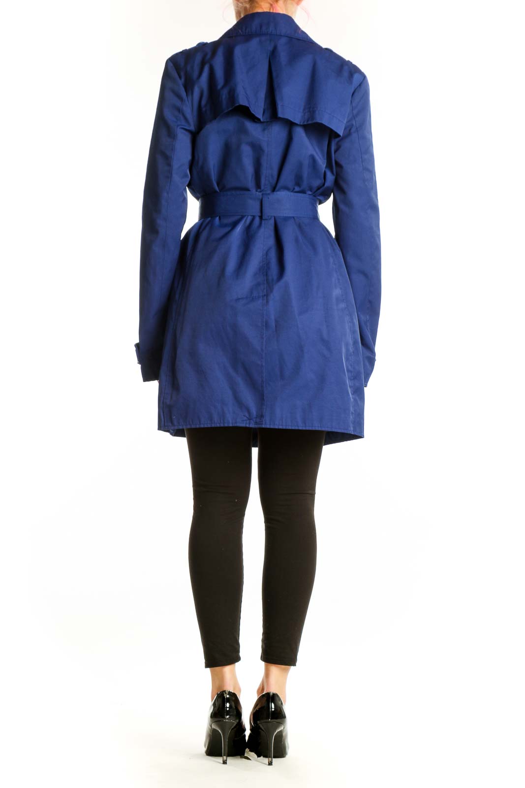 Navy double-breasted trench coat with belted waist and functional pockets, back view