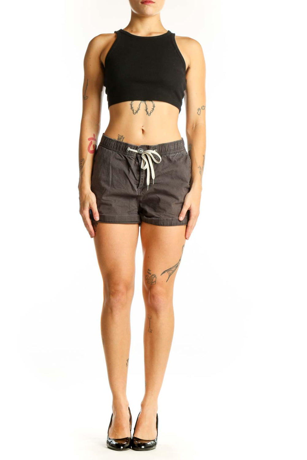 Front view of gray Vuori drawstring shorts on model