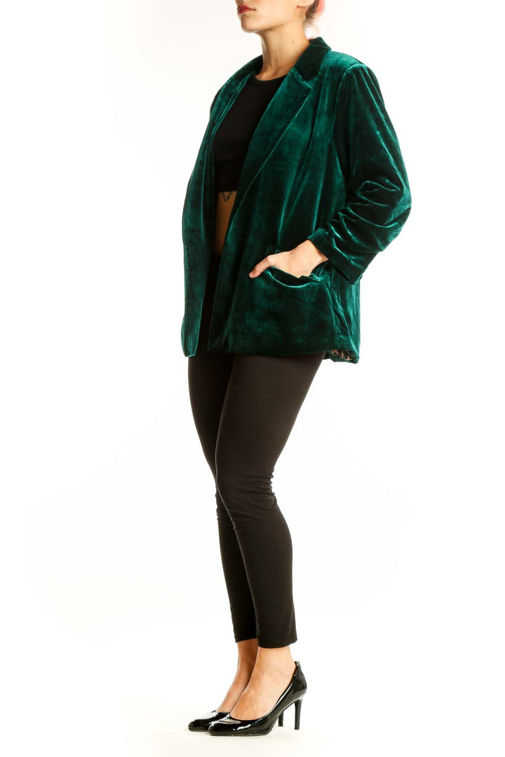 Front view of emerald green velvet blazer jacket by Skies Are Blue