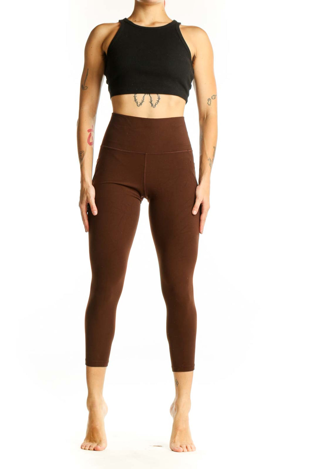 Front view of brown high-waisted capri leggings from Athleta
