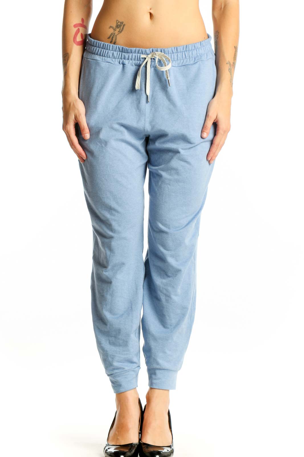 Front view of light blue Vuori jogger pants with drawstring waist