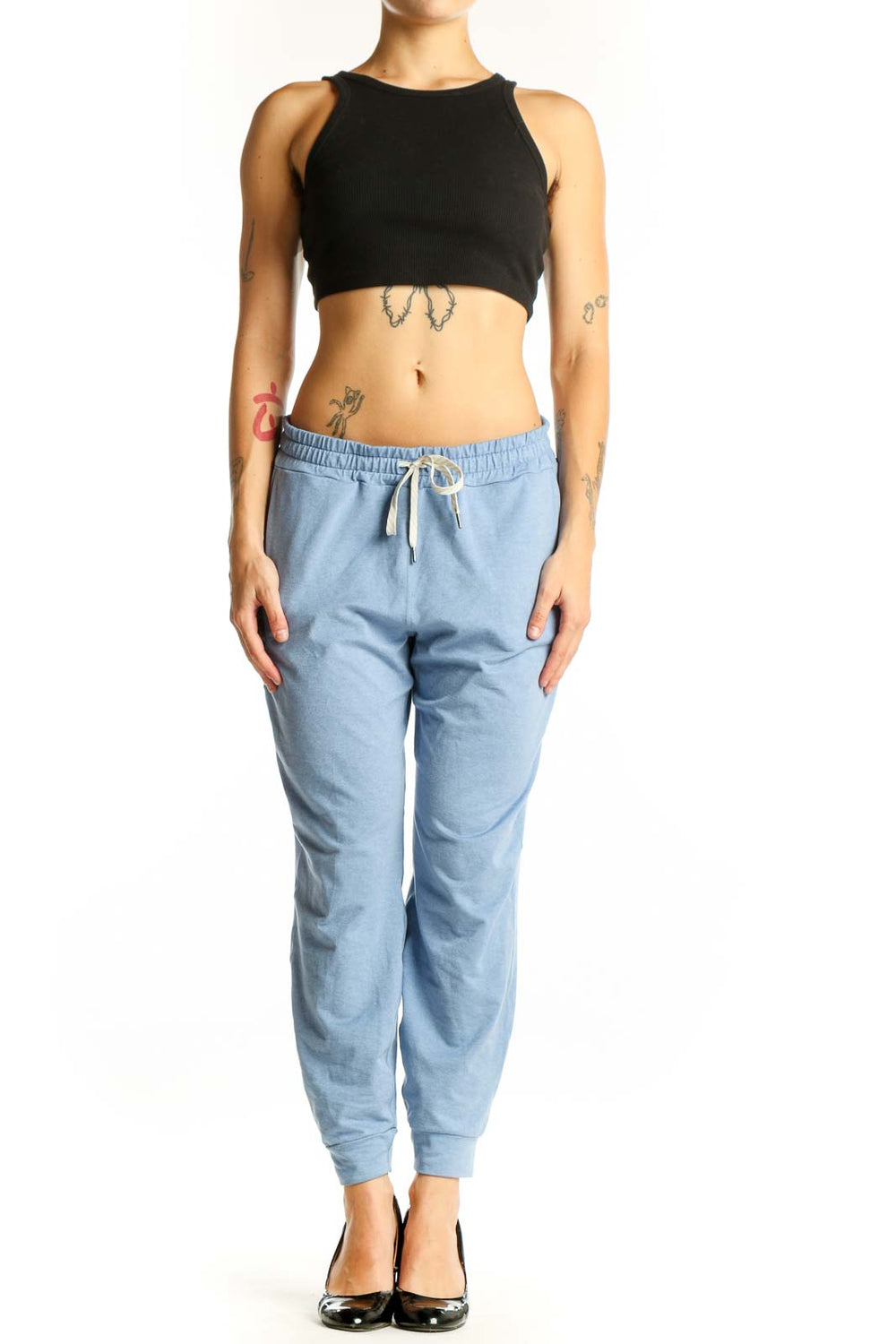Front view of light blue Vuori jogger pants with drawstring waist