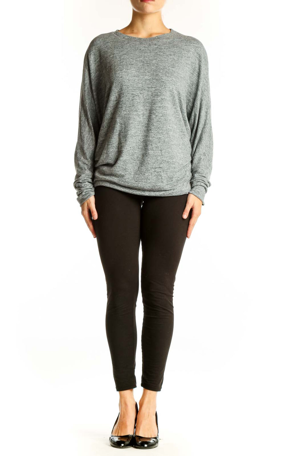 Front view of gray oversized knit sweater with long sleeves