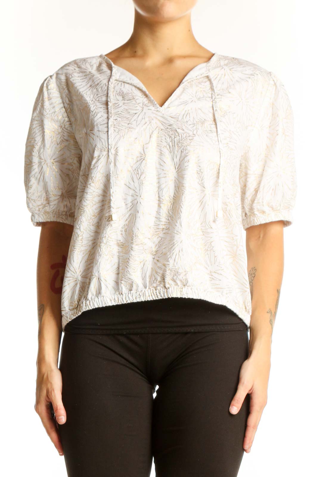 Front view of Michael Kors white cotton blouse with floral embroidery and puff sleeves