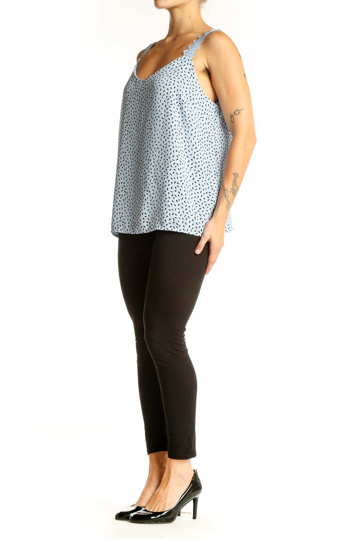 Front view of light blue floral print camisole top with lace-trimmed straps