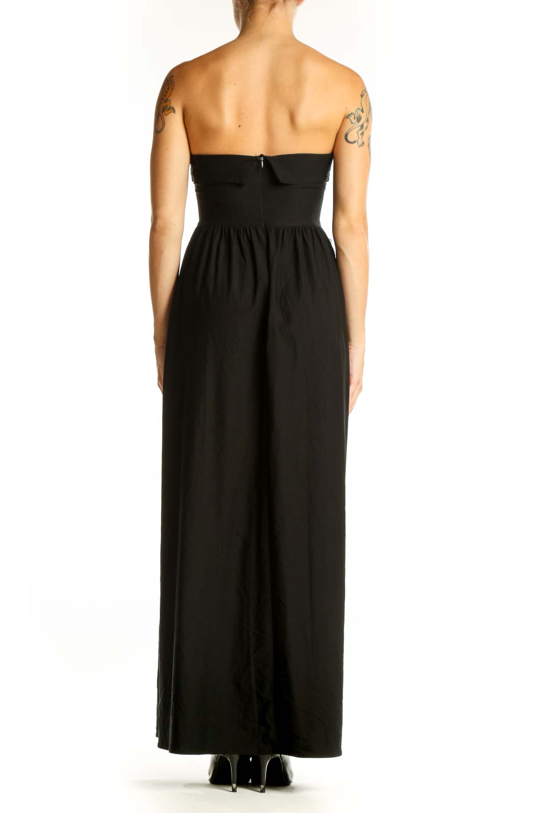 Side view of black strapless maxi dress by SilkRoll showing pockets