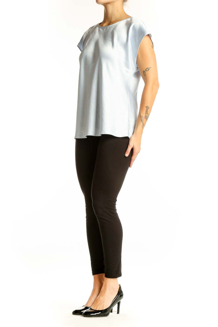 Front view of light blue cap sleeve top from Express