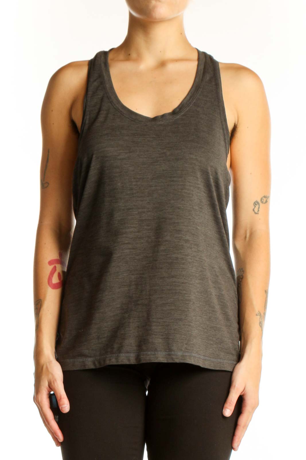 Front view of Vuori olive green racerback tank top on model