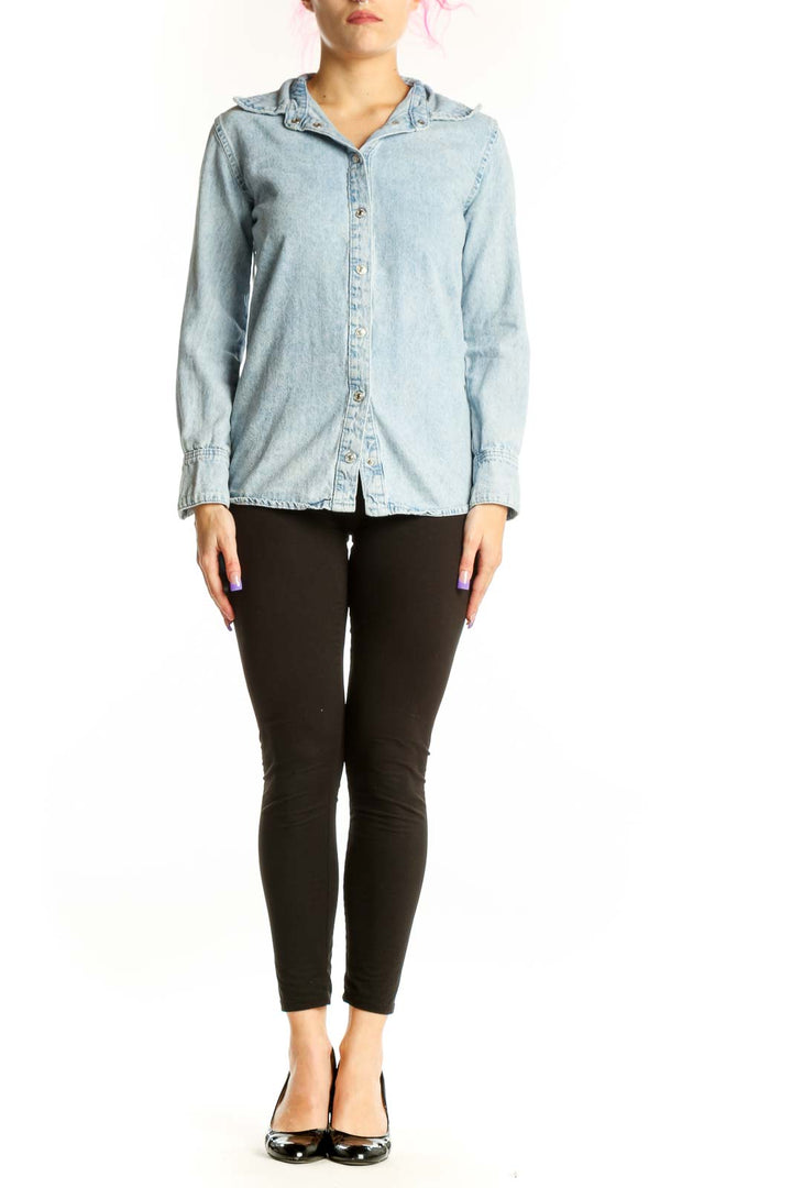 Light blue Mango denim button-up shirt front view, XS size with collar and long sleeves