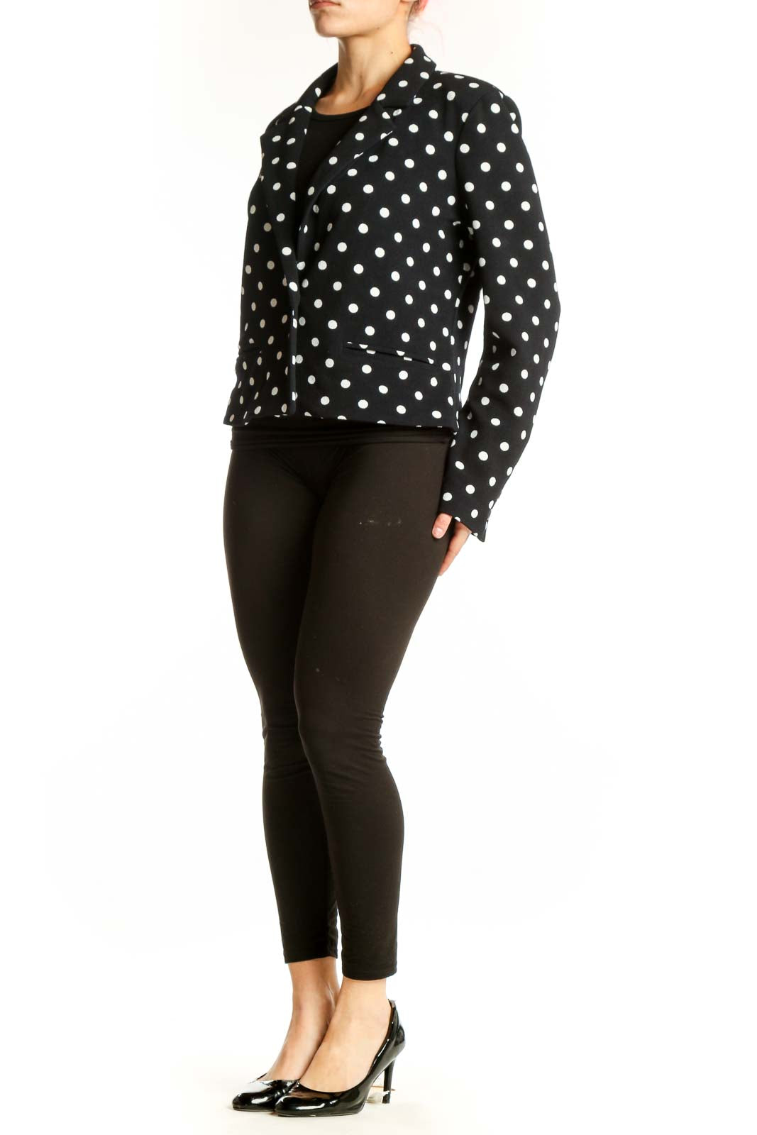 Black polka dot blazer with white dots, cropped fit, front view on model