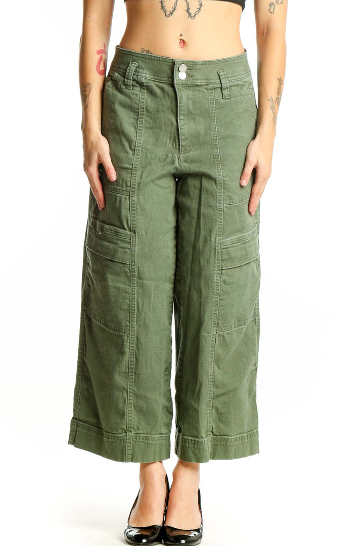 Front view of sage green cargo cropped pants with multiple pockets and relaxed fit
