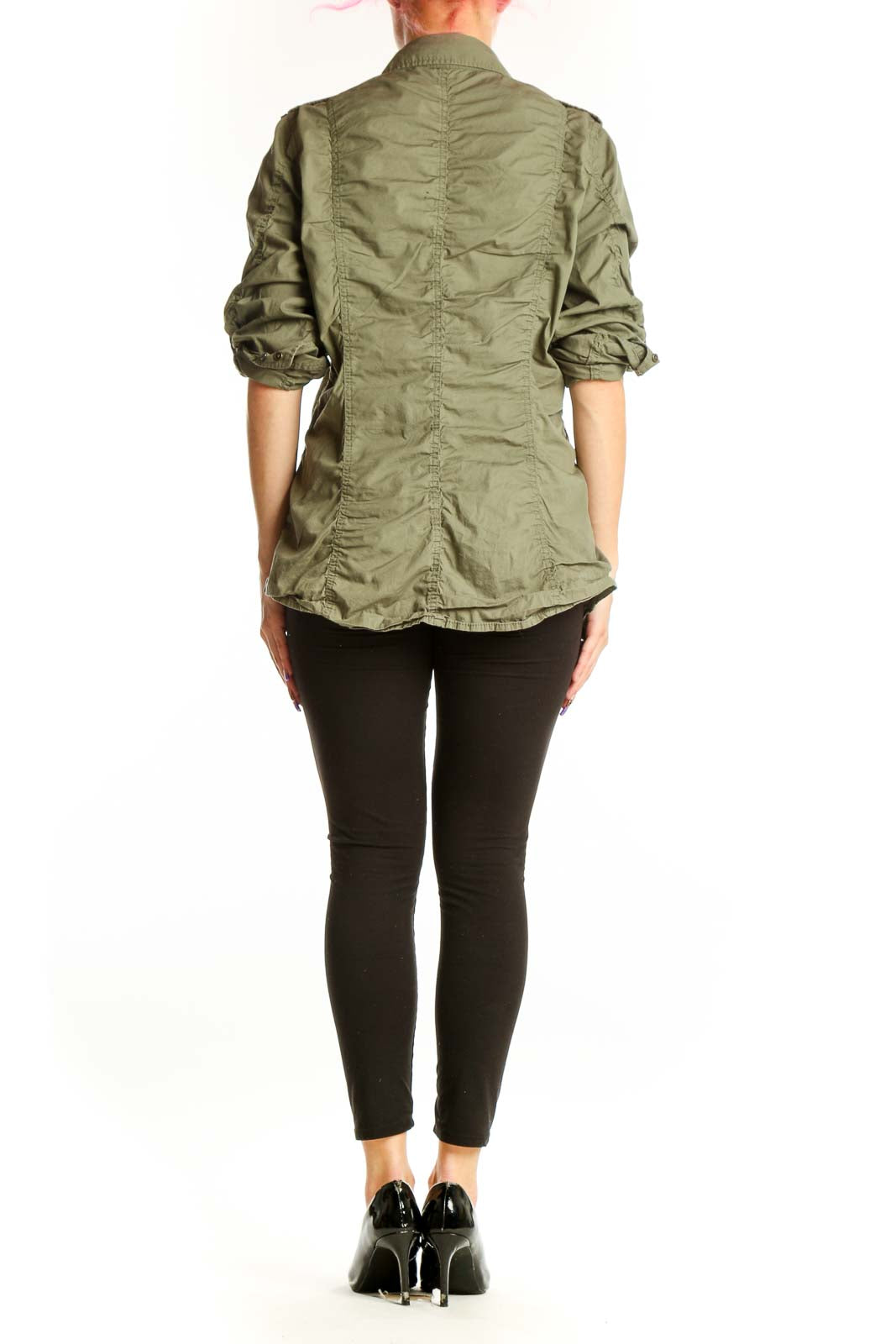 Back view of sage green cotton military shirt showing structured fit and military-inspired design