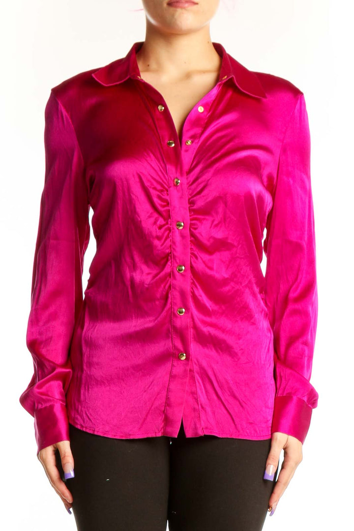 Front view of magenta silk ruched button-up blouse by Cache with gold-tone buttons and collared neckline