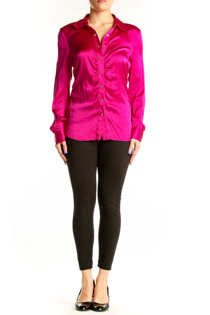 Front view of magenta silk ruched button-up blouse by Cache with gold-tone buttons and collared neckline