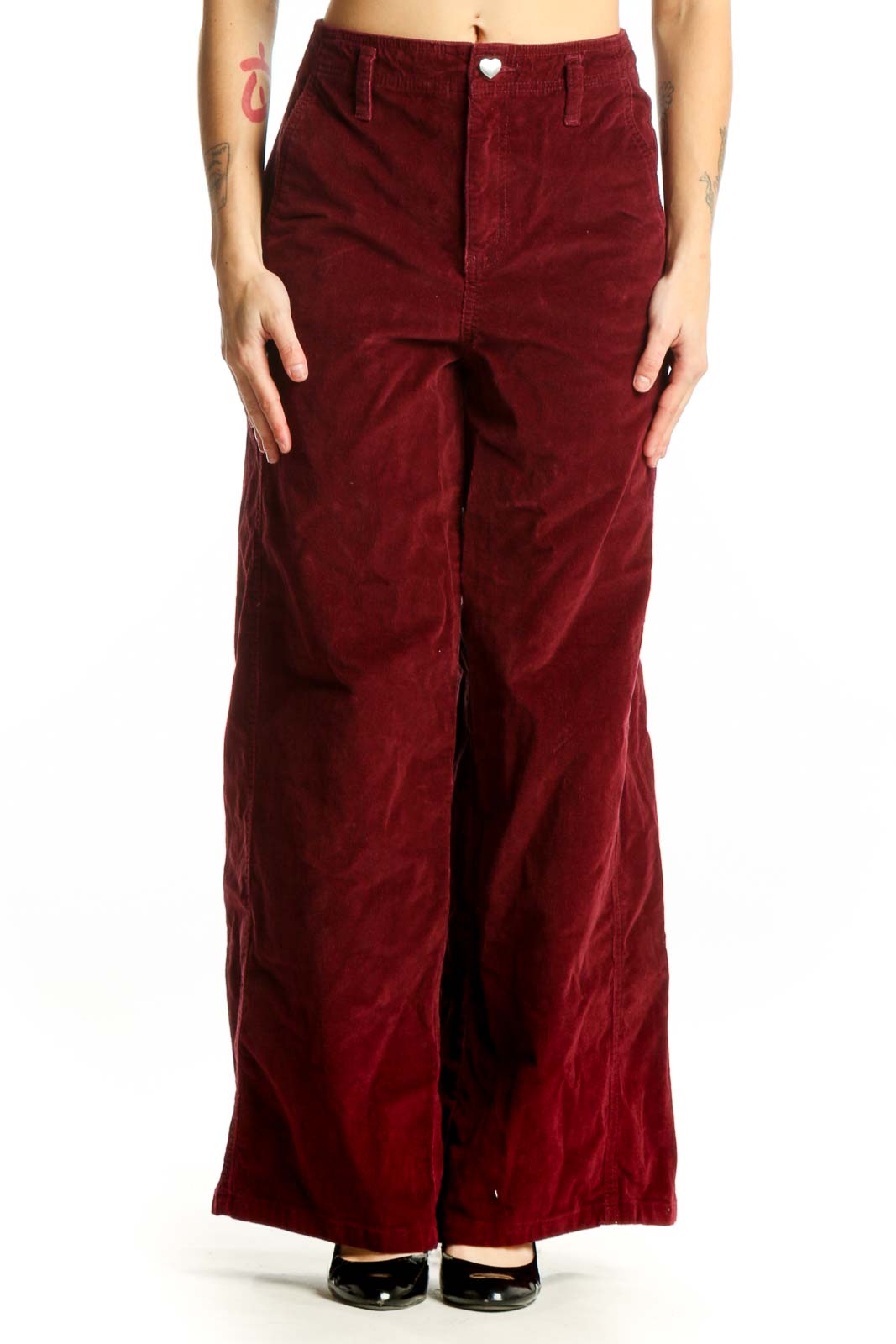 Burgundy velvet wide-leg pants by Celebrity Pink, front view showing high-waisted fit and classic five-pocket design