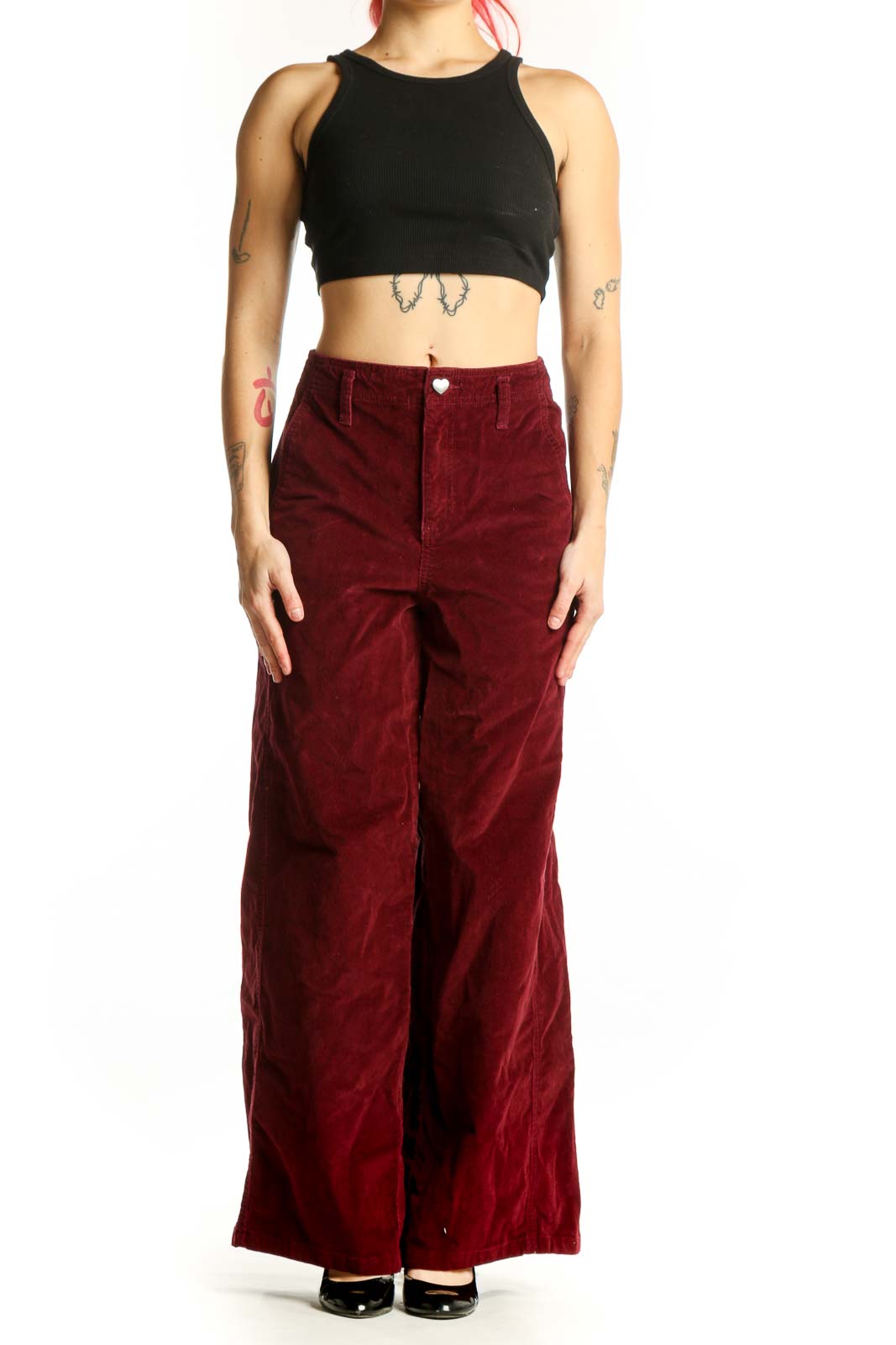 Burgundy velvet wide-leg pants by Celebrity Pink, front view showing high-waisted fit and classic five-pocket design