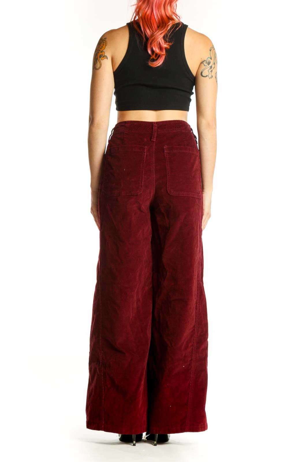 Burgundy velvet wide-leg pants by Celebrity Pink, back view displaying elegant drape and floor-grazing silhouette