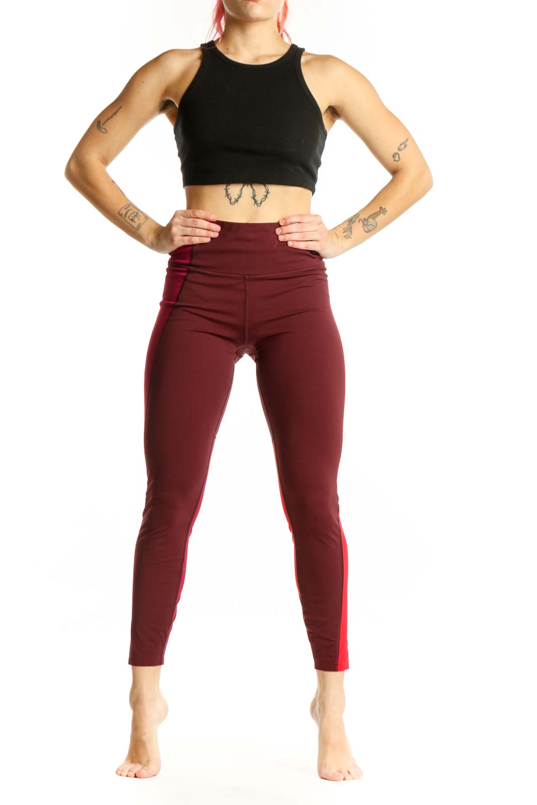 Burgundy and red colorblock cropped leggings front view, high-waisted fit with side stripe detail