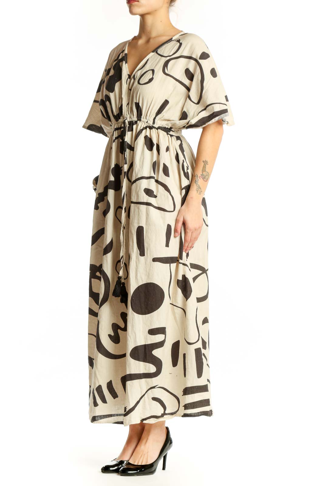 Cream and black abstract print midi dress with V-neckline and flutter sleeves, front view