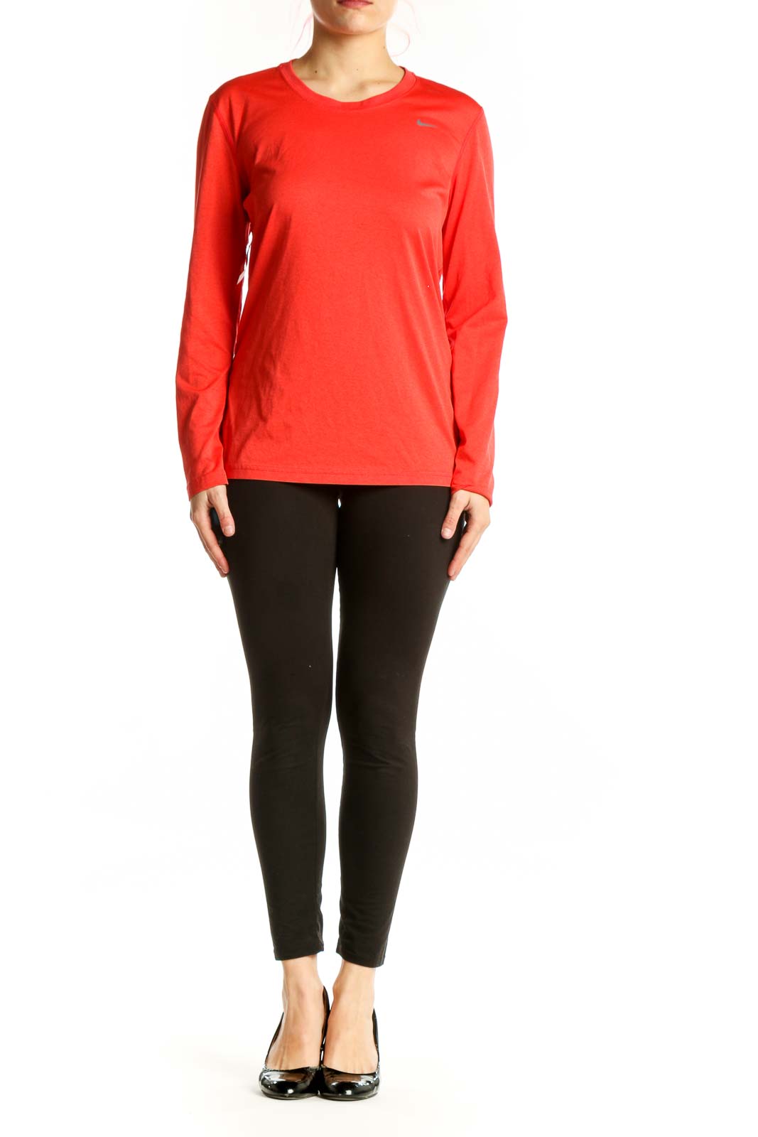 Red Nike long sleeve athletic top with crew neckline, front view on model