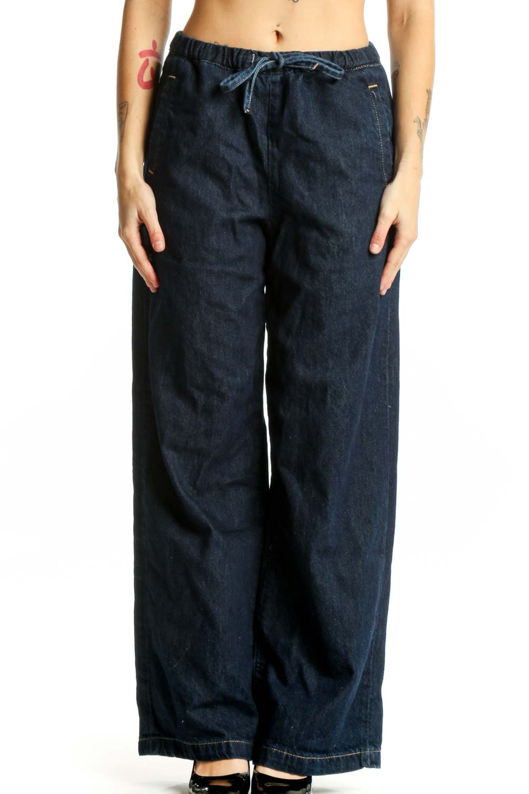 Navy wide-leg denim pants with drawstring waist, front view on model