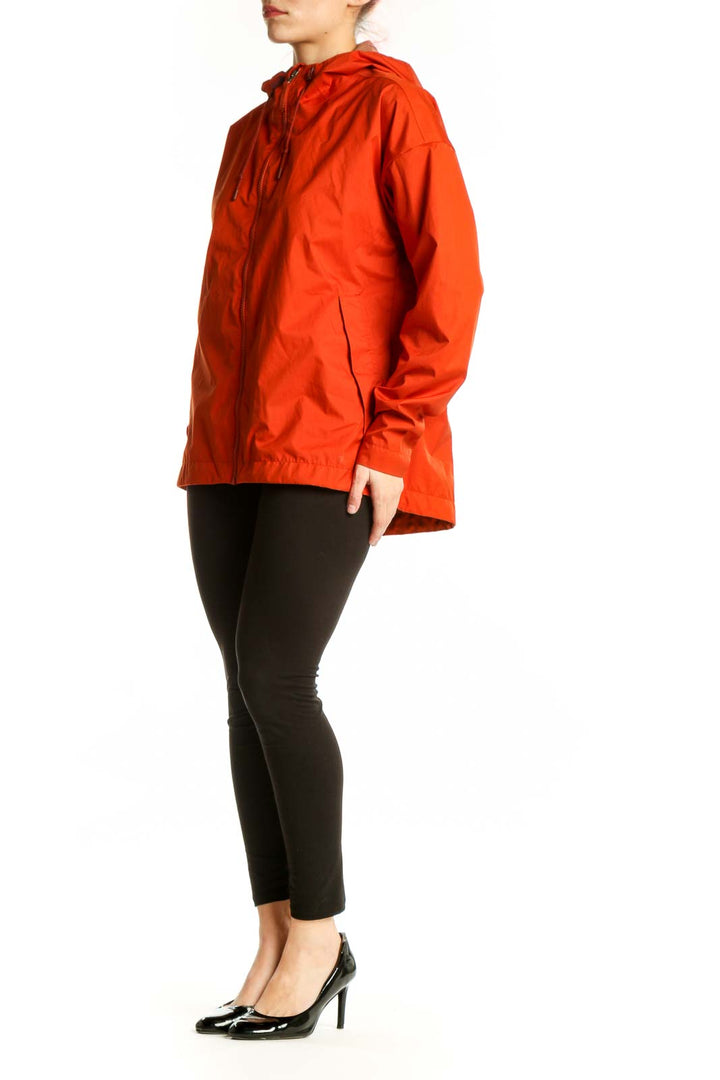 Red polyester hooded windbreaker jacket with full front zip and drawstring hood, displayed on model from front view
