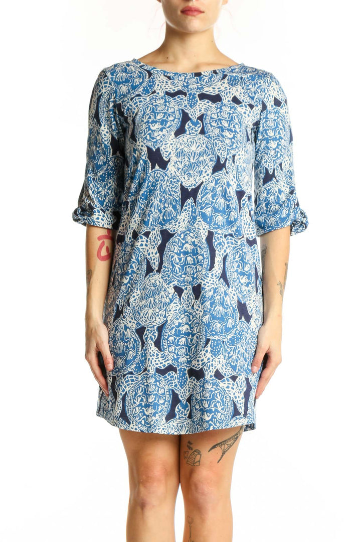 Blue abstract patterned Lilly Pulitzer shift dress with three-quarter sleeves, front view