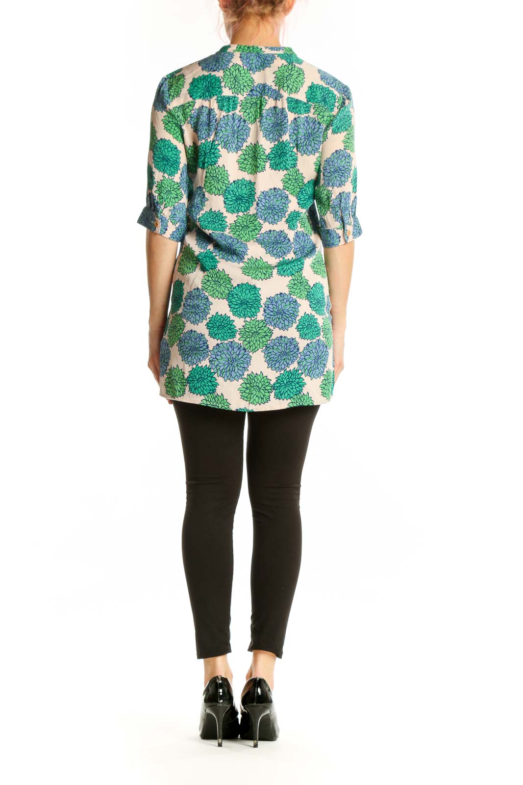 Back view of green floral silk tunic top showing relaxed fit and button-up design