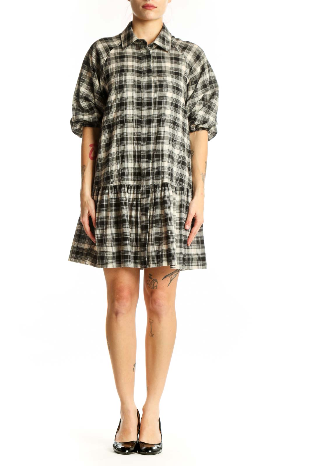 Black and white plaid button-down shirt dress with peplum hem, front view