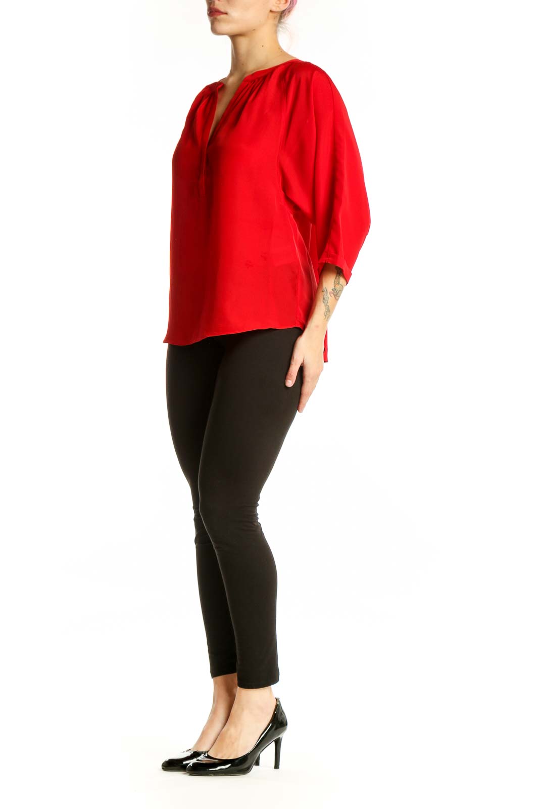 Red polyester henley blouse with V-neckline and three-quarter sleeves, front view
