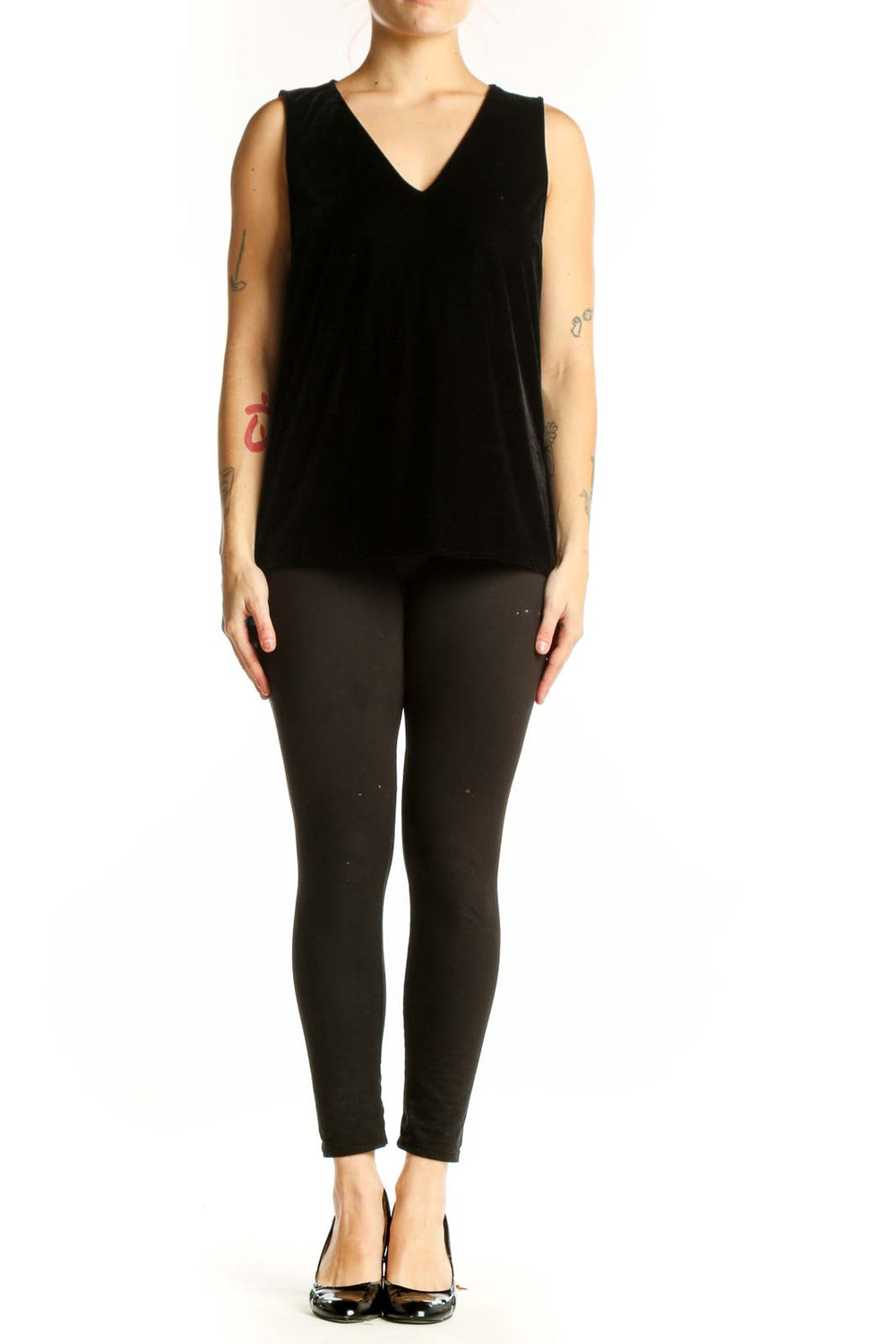 Black velvet sleeveless tank top with V-neckline, front view on model