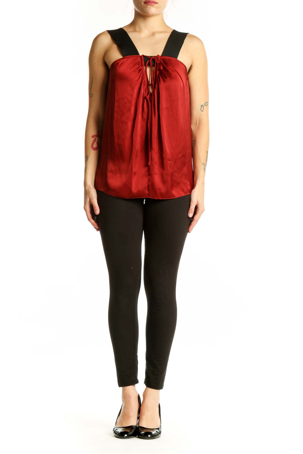 Red sleeveless top with black shoulder straps and drawstring neckline detail, front view