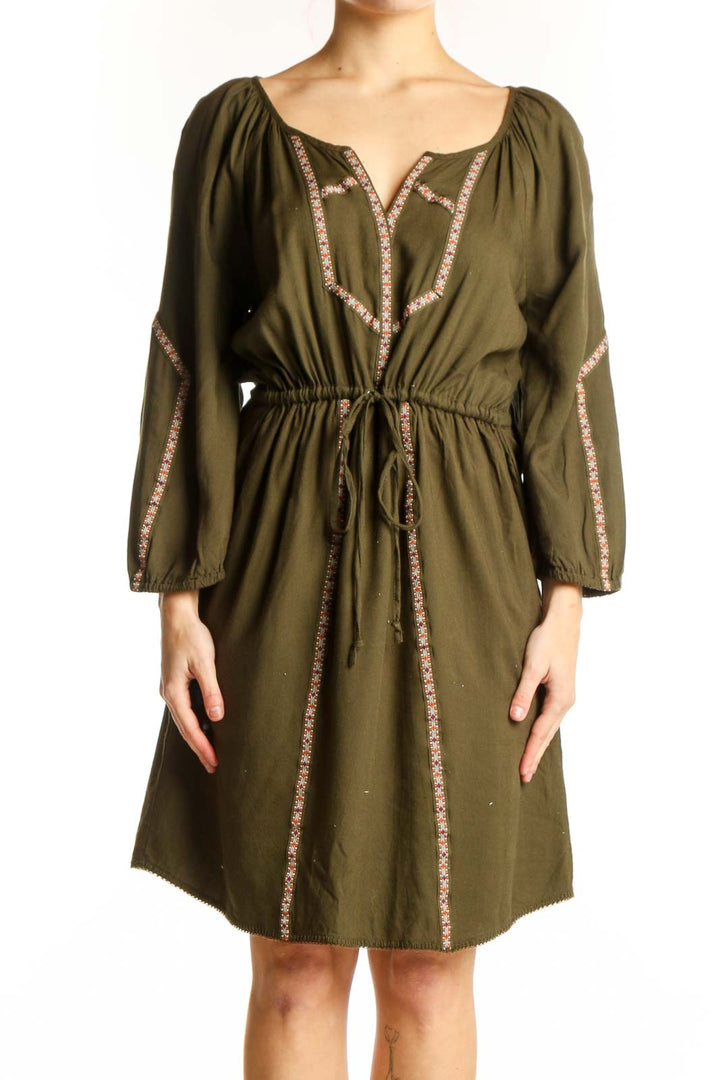 Olive green peasant dress with embroidered neckline and long sleeves, front view