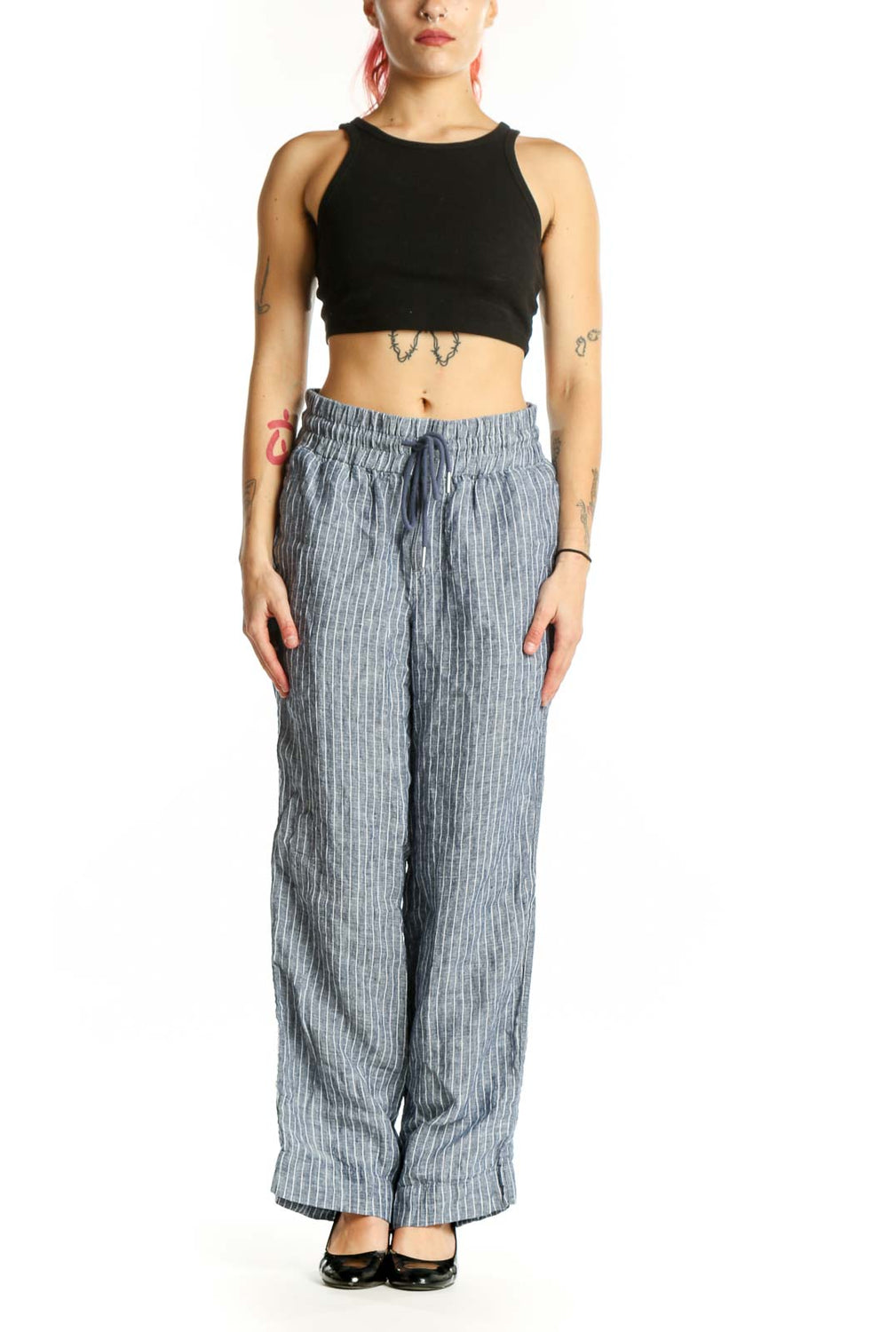 Gray pinstriped linen wide-leg pants with elastic waistband and drawstring tie, front view