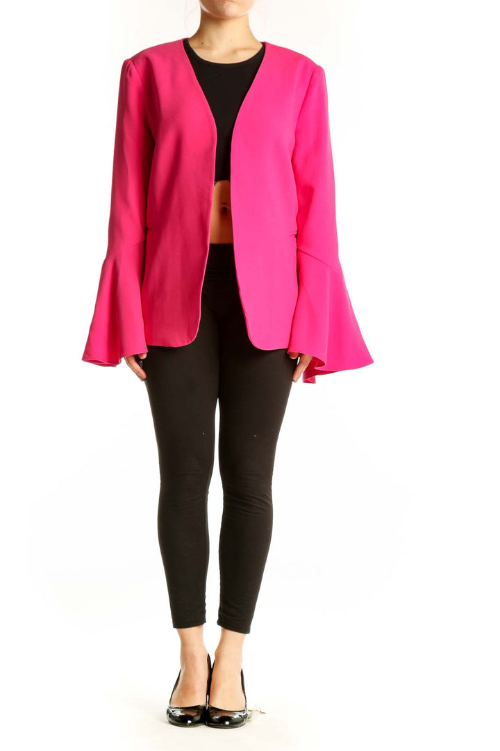 Front view of pink bell sleeve blazer jacket with open front design and black trim