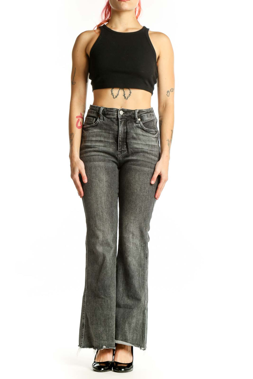 Front view of gray flare denim jeans by JUDY BLUE with high-rise waist and distressed hem detail