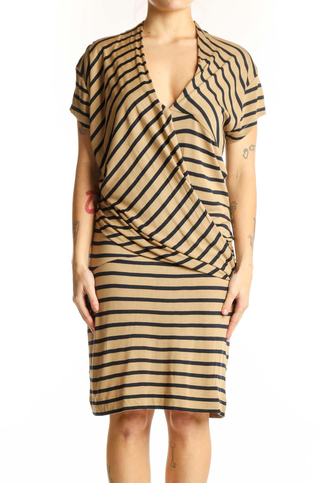 Beige and black striped wrap dress with short sleeves and wrap-front neckline, front view
