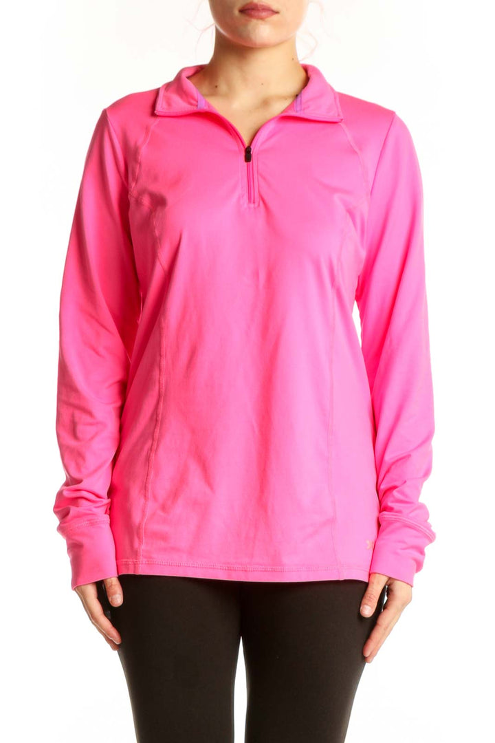 Pink half-zip activewear pullover with raglan sleeves and collar, front view