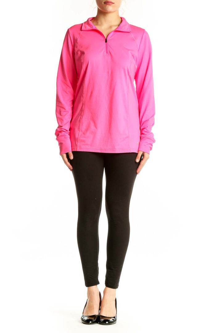 Pink half-zip activewear pullover with raglan sleeves and collar, front view