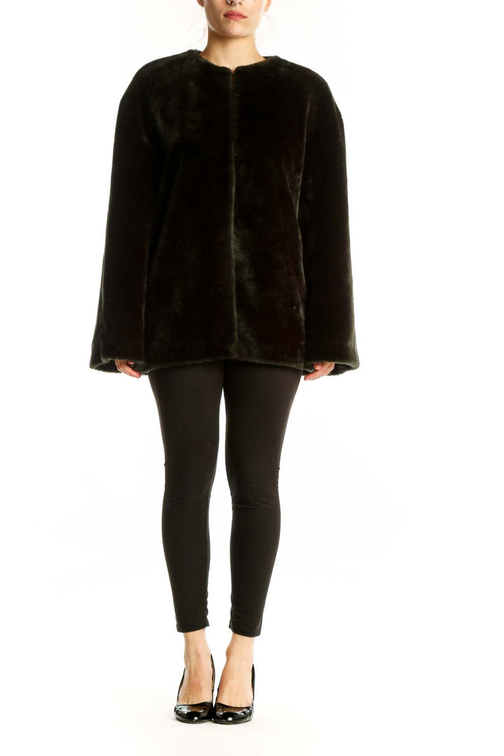 Black velvet button-front jacket with oversized fit and relaxed silhouette