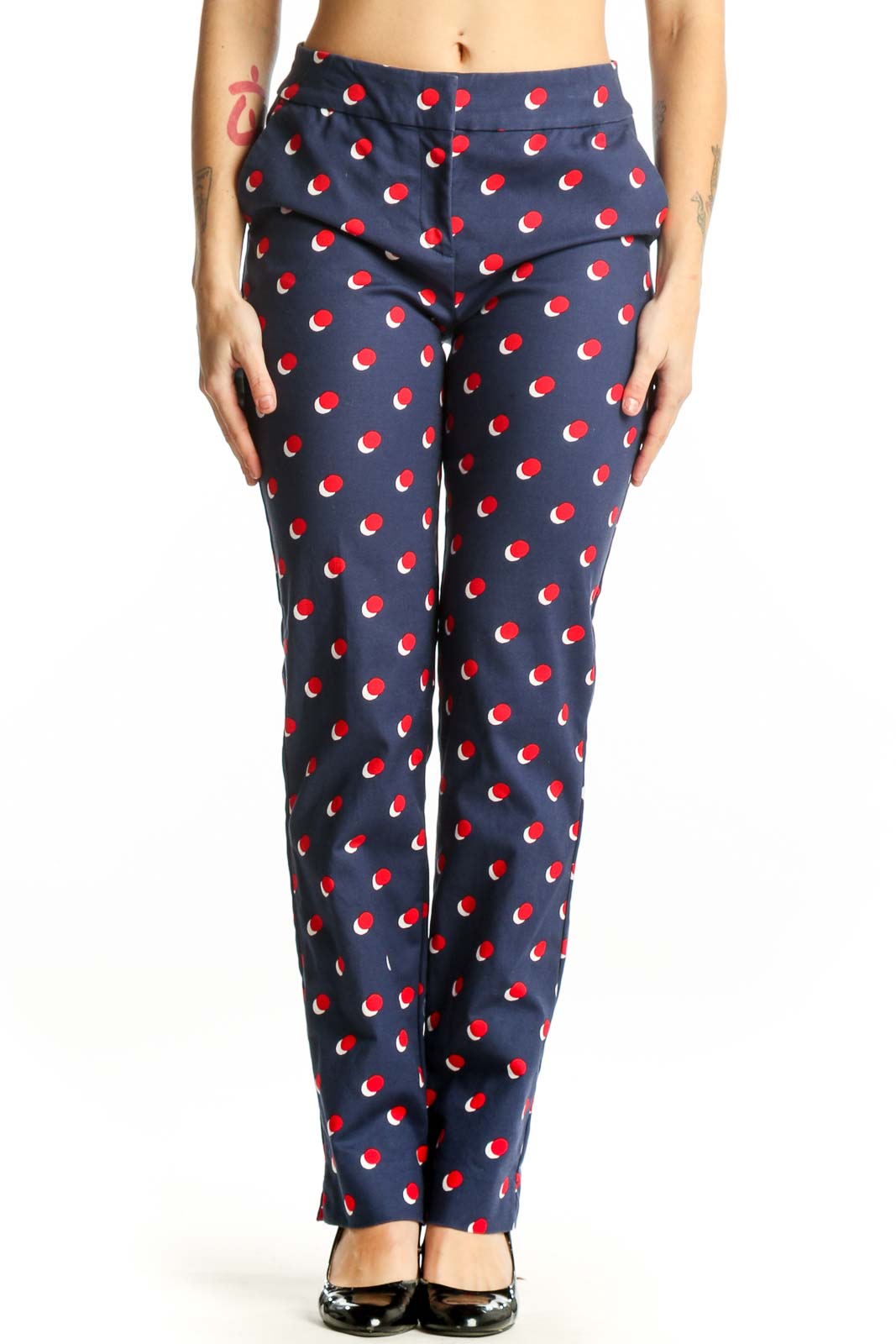 Navy Boden pants with red apple print, front view on model, size S