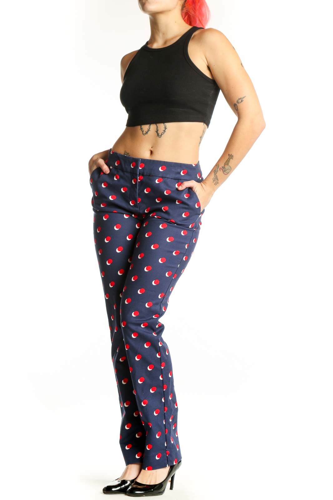 Navy Boden pants with red apple print, front view on model, size S