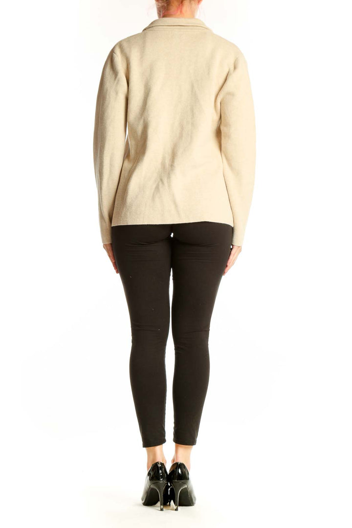 Back view of cream cotton knit blazer by J.Crew showing structured fit and tailored silhouette