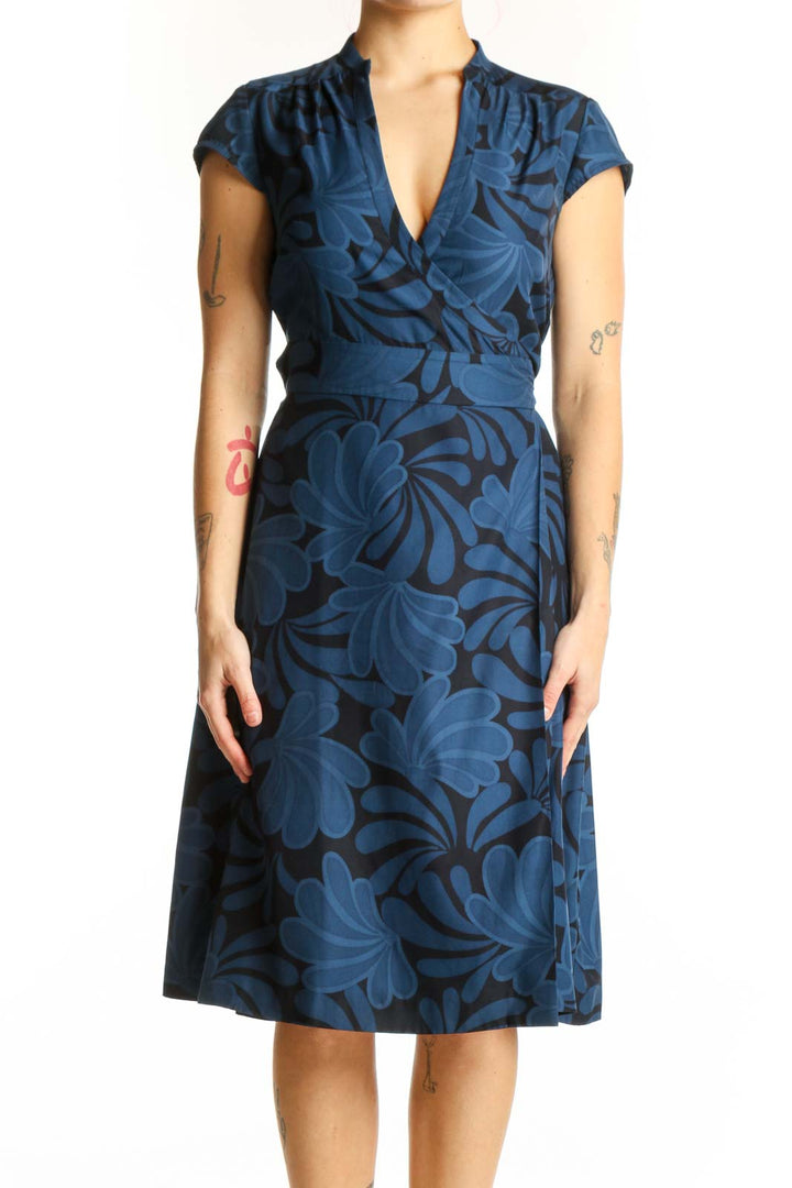 Navy floral wrap midi dress with cap sleeves and wrap-front design, front view